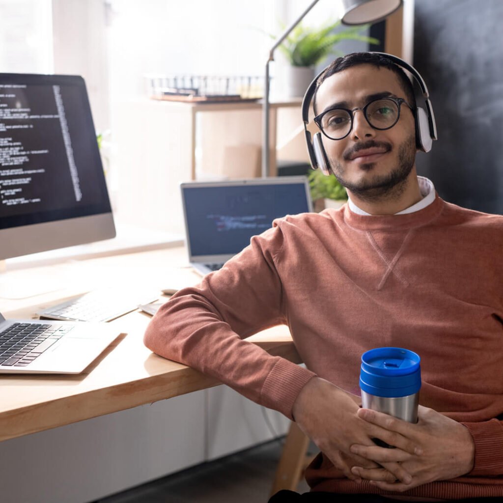 E-commerce web development: building online stores that sell. Handsome Programmer In Headphones Listening To Mus 2023 11 27 04 56 48 Utc 2 1024x1024